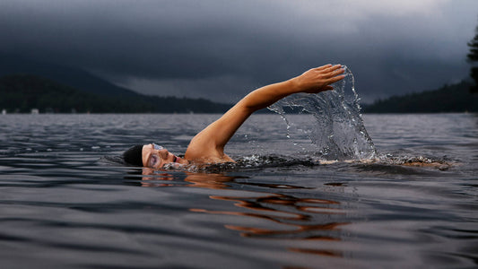 Person Swimming In Lake